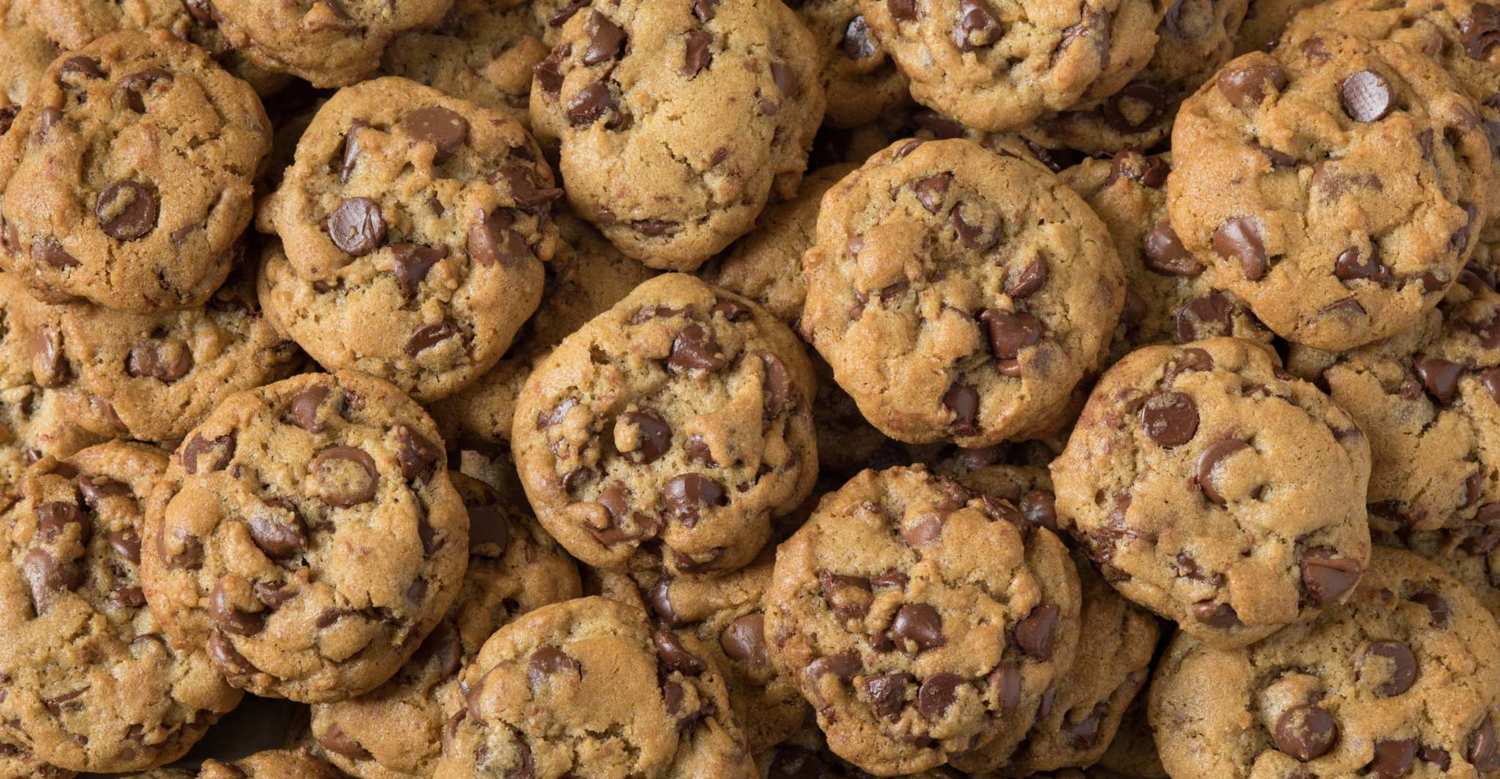 Photo shows a massive pile of chocolate chip cookies. From sweet to savory, CBD cooking doesn't have to be complicated.