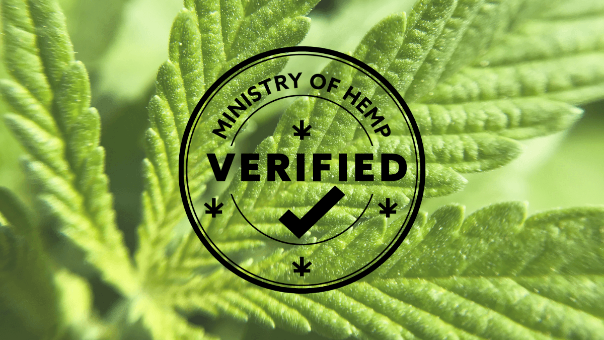 A close up of a hemp leaf, superimposed with the circular Verified By Ministry of Hemp logo.